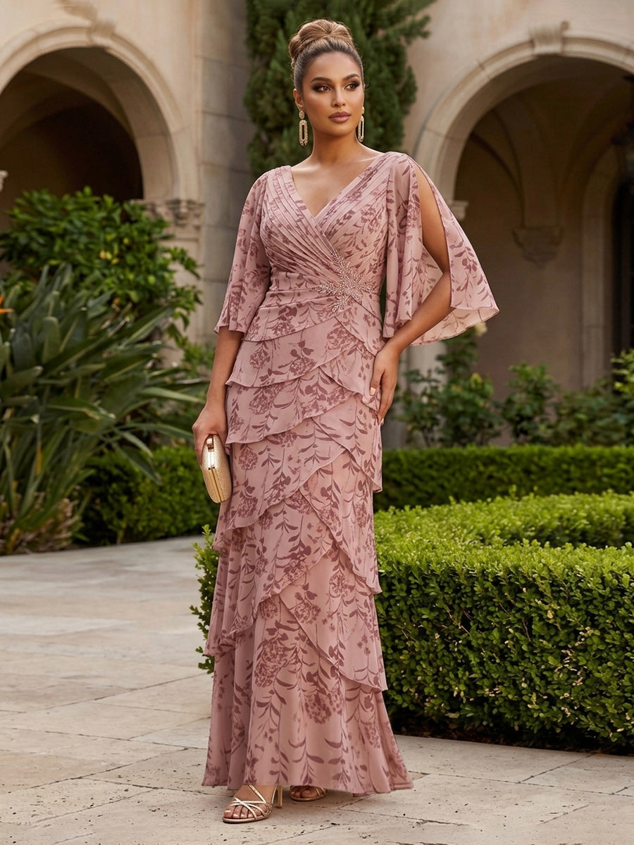 Shirees A-Line Chiffon Floral Print 3/4 Cape Sleeves Tiered Mother of the Bride & Groom Dresses with Beaded Waist Embellishment 2026 Shirees A-Line Chiffon Floral Print 3/4 Cape Sleeves Tiered Mother of the Bride & Groom Dresses with Beaded Waist Embellishment 2026