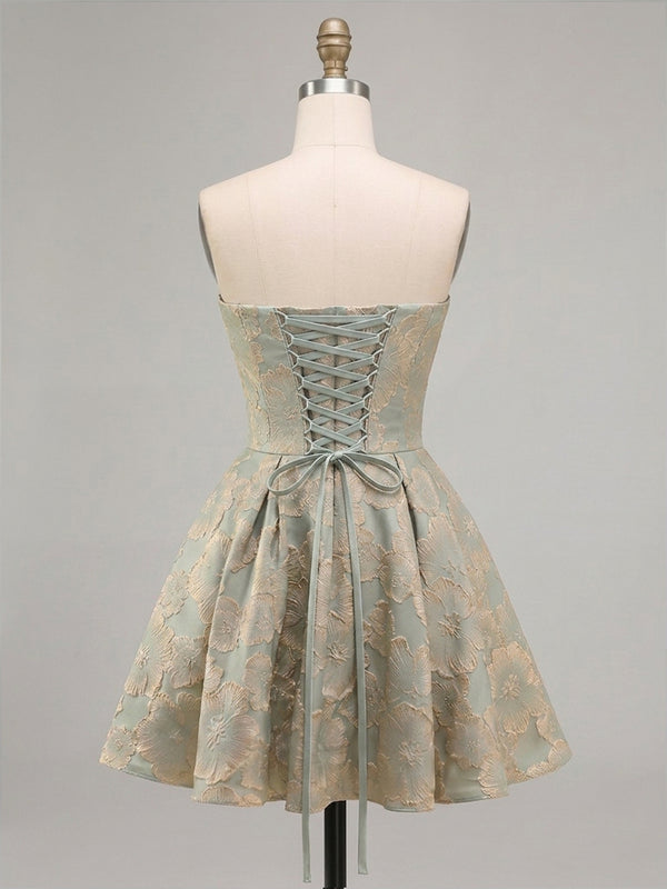 A-Line/Princess Strapless Jacquard Mini Homecoming Dresses with Pleats