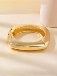Round Luxurious Wide Band Hammered Gold Bracelet