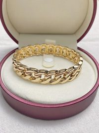 Round Luxurious Wide Band Hammered Gold Bracelet